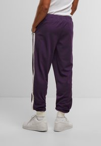 Sergio Tacchini NEW DAMARINDO JOGGING - Treningo apatinė dalis - blackberry cordial gardenia