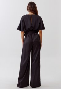 TUSSAH SELINE - Kombinezon - black