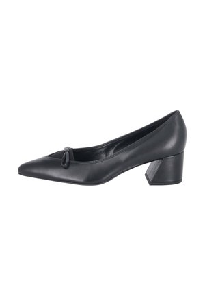 Zapato de salón de mujer en piel negra con puntera puntiaguda, tacón grueso de altura media y pequeño lazo decorativo en la parte delantera.