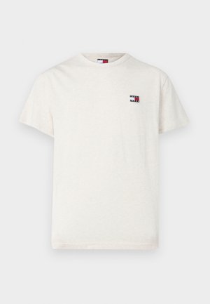 Short-sleeve, cream-colored t-shirt made of soft fabric. Features a small, multicolored logo on the left chest. Classic crew neckline.