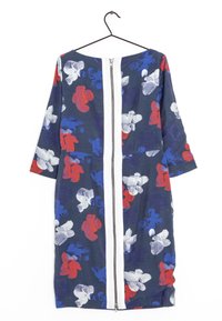 Navy dress featuring red, white, and blue floral patterns. Round neckline, three-quarter sleeves, and a front zipper detailed with white.