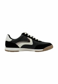 Black and white athletic shoes with a suede and synthetic upper, featuring a metallic accent, round toe, and beige rubber sole.