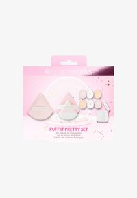 Set di spugnette per il trucco che include due spugnette rosa, diverse mini spugnette e un contenitore bianco, il tutto presentato in un packaging rosa e oro a tema stellato.
