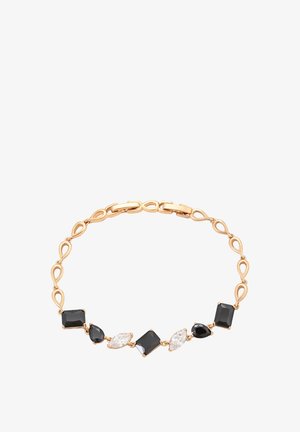 Aukso spalvos apyrankė, kurios sudėtyje yra pakaitomis juodų ir baltų brangakmenių, įskaitant stačiakampius ir marquise formos akmenis, sujungtų dekoratyvinėmis kreivėmis.