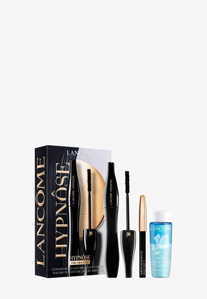 Lancôme Hypnôse mascara set with two black mascara tubes, a black and gold eyeliner, and a blue makeup remover bottle.