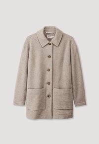 Cappotto in misto lana beige con colletto, bottoni frontali e due grandi tasche. Caratterizzato da una superficie texturizzata e una vestibilità rilassata.