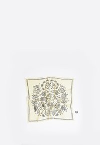 Kreem värvi ruudukujuline siidist sall, millel on mustad joonistused lillede, lindude ja taevakehade motiividega, kaunistatud dekoreeritud mustriga äärega.