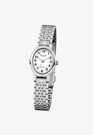 Montre-bracelet en métal argenté avec cadran rond blanc, chiffres noirs, trois aiguilles et bracelet à maillons, affichant l'heure 2:11:38.