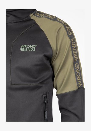 Black and olive green long-sleeve pullover with a zip pocket, featuring "WRONG FRIENDS" branding on the left shoulder and along the sleeve.