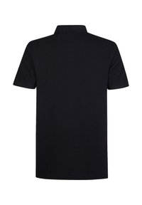 Polo nero a maniche corte, con colletto e un design pulito sul retro. Realizzato in tessuto liscio, presenta cuciture minimali e nessun logo visibile.