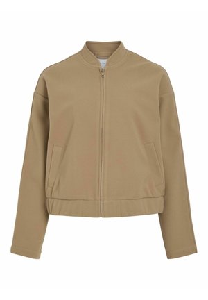 Beige bunda na zip s kulatým límcem, spadlými rameny a bočními kapsami. Vyrobena z hladkého, měkkého materiálu s tvarovaným střihem.
