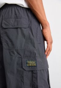 Champion Rochester SURPLUS PARACHUTE PANTS - Cargobukse - black