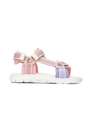 Sandalia infantil de punta abierta con suela blanca, correas ajustables de tela rosa y morada, y soporte acolchado para el talón.