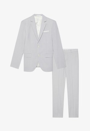Light gray suit consisting of a jacket with notch lapels, two front pockets, and matching trousers with a slim fit and smooth texture.