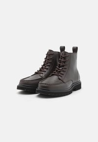 Calvin Klein Jeans Šněrovací kotníkové boty - dark brown