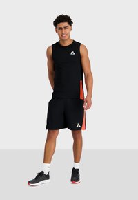 le coq sportif TRAINING - Teplákové kalhoty - black