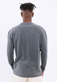 YOURTURN UNISEX - Ilgarankovis viršutinės dalies drabužis - black washed