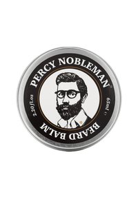 Cirkulär metalcontainer med en svart etikett som har en vintage-inspirerad illustration av en man med skägg och glasögon; texten lyder "PERCY NOBLEMAN BEARD BALM."
