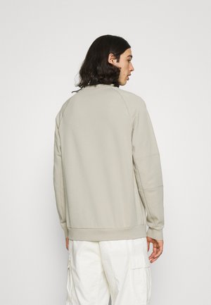 MODERN - Sudadera - stone/white