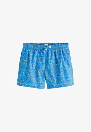 Blaue Badeshorts mit Kordelzug am Bund, mit kleinem Muster aus Flaschen und Gläsern in Weiß, Gelb und Grün.
