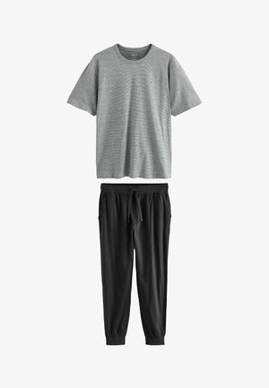Grey short-sleeve t-shirt with a round neckline, paired with black jogger pants featuring an elastic waistband and ankle cuffs.