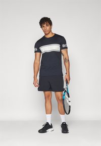Björn Borg ACE SHORT SHORTS - Sportiniai šortai - black beauty