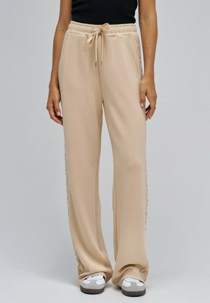 MONACO - Pantalones deportivos - beige