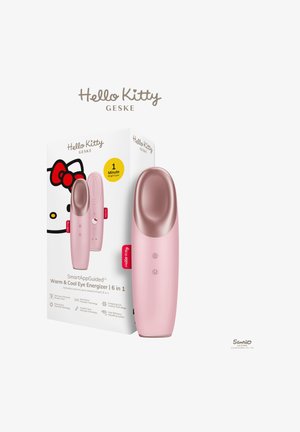 Appareil masseur pour les yeux rose de la marque Hello Kitty avec fonctions chaude et froide, accompagné de sa boîte d'emballage blanche affichant le logo Hello Kitty.