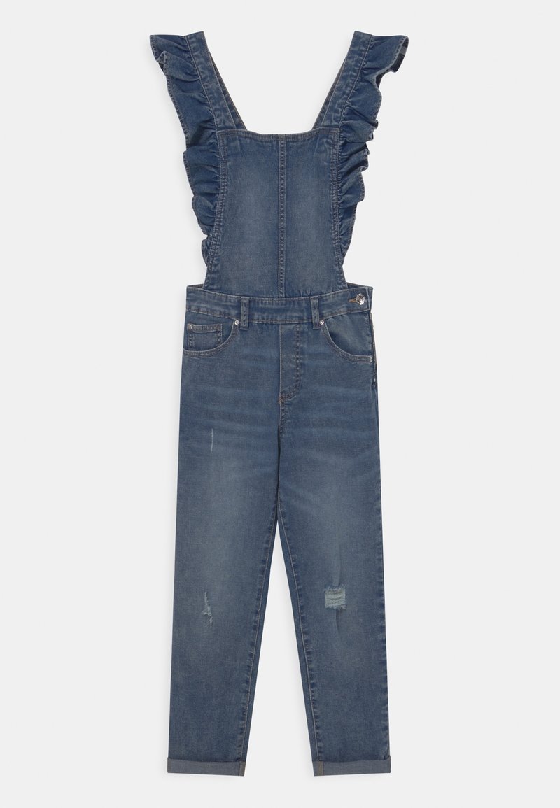 Salopette in denim con bretelle arricciate sulle spalle, tasche frontali, dettagli leggermente consumati e risvolti sui pantaloni.