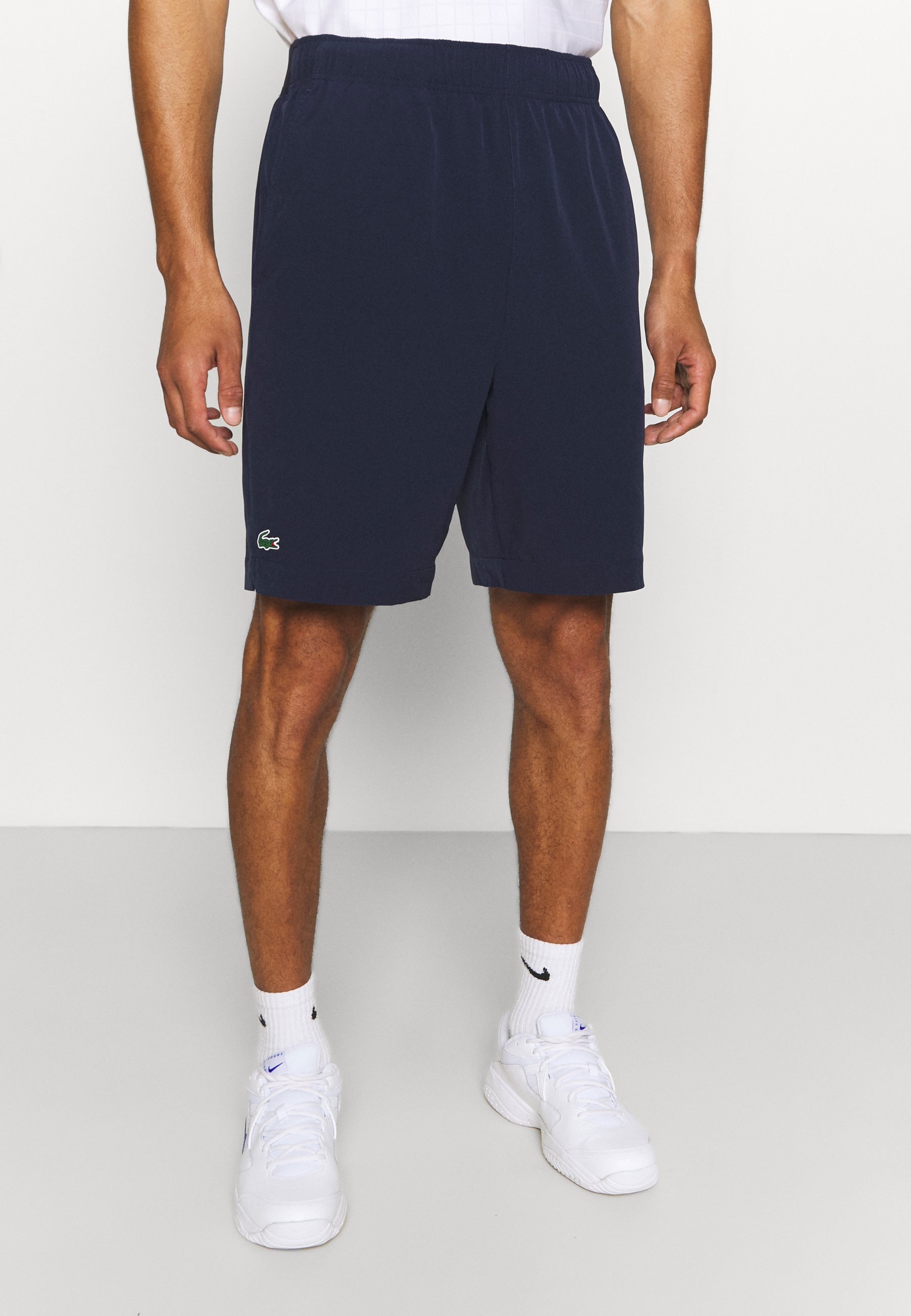 Lacoste Sport TENNIS SHORT - Sports shorts - navy blue/white/dark blue -  Zalando