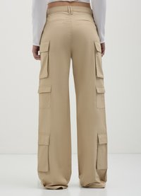 Calliope MULTITASCHE  - Cargohose - beige