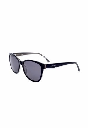Occhiali da sole Tom Tailor neri con lenti scure e montatura arrotondata, mostrati inclinati su sfondo bianco. Non sono presenti persone.