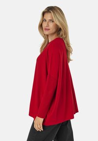 Masai Strickpullover - haute red