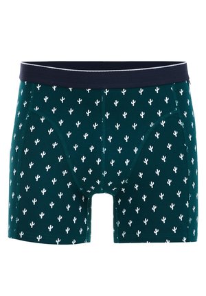 Férfi boxeralsó sötétzöld anyagból, fehér kaktusz mintával, tengerészkék elasztikus derékrésszel és szoros illeszkedésű kialakítással.