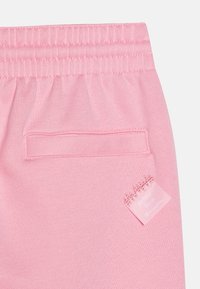 Champion EXCLUSIVE PANT UNISEX - Tréningruha alsók - pink