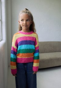 Knitted sweater with multicolored horizontal stripes in pink, purple, green, blue, orange, and yellow. Loose fit and textured fabric.