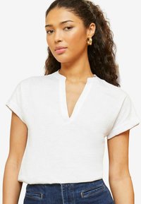 Unselected, ivory white
