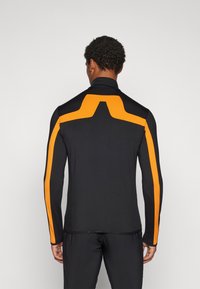 J.LINDEBERG Sports JARVIS MID LAYER - Sportinė striukė - persimmon orange