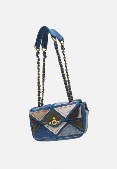 Denim shoulder bag with gold chain straps, featuring a geometric pattern of colorful triangles in red, blue, green, and white.