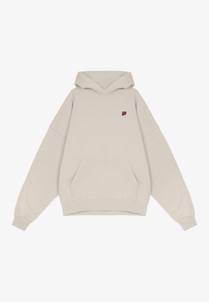 Beige Kapuzenpullover aus weichem Stoff, mit einer Fronttasche und einer Kapuze mit Kordelzug. Kleines pinkes Logo im oberen linken Brustbereich.