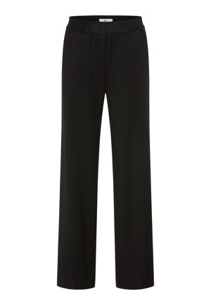 Pantalon ample noir avec taille élastique et détail de logo subtil sur la bande, présenté sur fond blanc.
