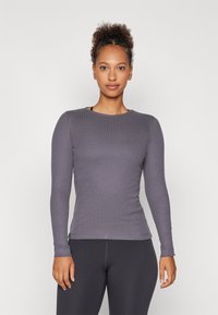 Yogasearcher MAUNA - Pikkade varrukatega topp - carbon