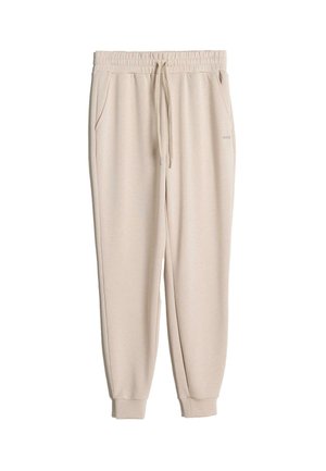 Beezid sweatpants, mis on valmistatud pehmest kangast, elastse vöökohtaga, millel on pael, küljetaskud ja mansetid.