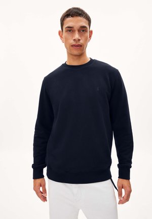 Navyblauwe sweatshirt gemaakt van katoenmix, met een ronde hals, lange mouwen, geribbelde boorden en een klein logo op de borst.
