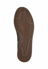 Musta urheilusneakerin pohja, jossa on aaltoileva ruskea tekstuuripinta, joka sisältää sileän, pyöristetyn reunan ja vahvistetun sivun kestävyyden lisäämiseksi.