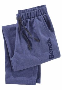 Navyblaue Jogginghosen aus weichem Material mit einem elastischen Bund und Kordelzug, seitlichen Taschen und einem "Bench."-Logo am Bein.