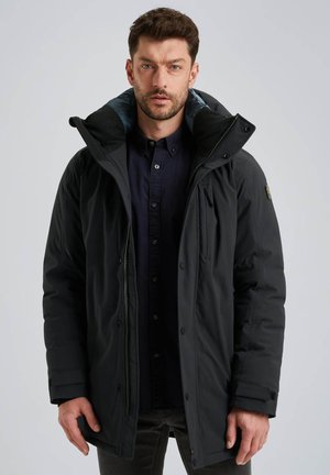 Black insulated jacket with a high collar and a zipper closure, featuring a blue inner lining and elastic cuffs. Front pockets included.
