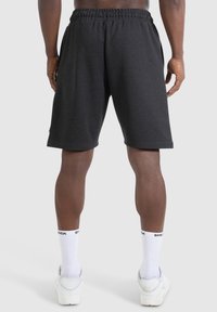Smilodox NALE TRAINING SHORTS - Korte broeken - schwarz melange