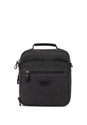 Sac bandoulière compact en tissu noir avec plusieurs compartiments zippés et une poignée supérieure pour le transport.