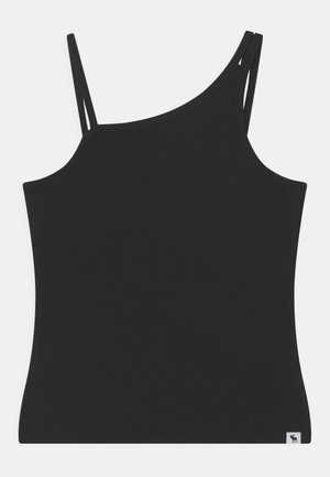 Sort ærmeløs asymmetrisk tanktop med to tynde stropper på hver side og en lille logo-label ved kanten på hvid baggrund.